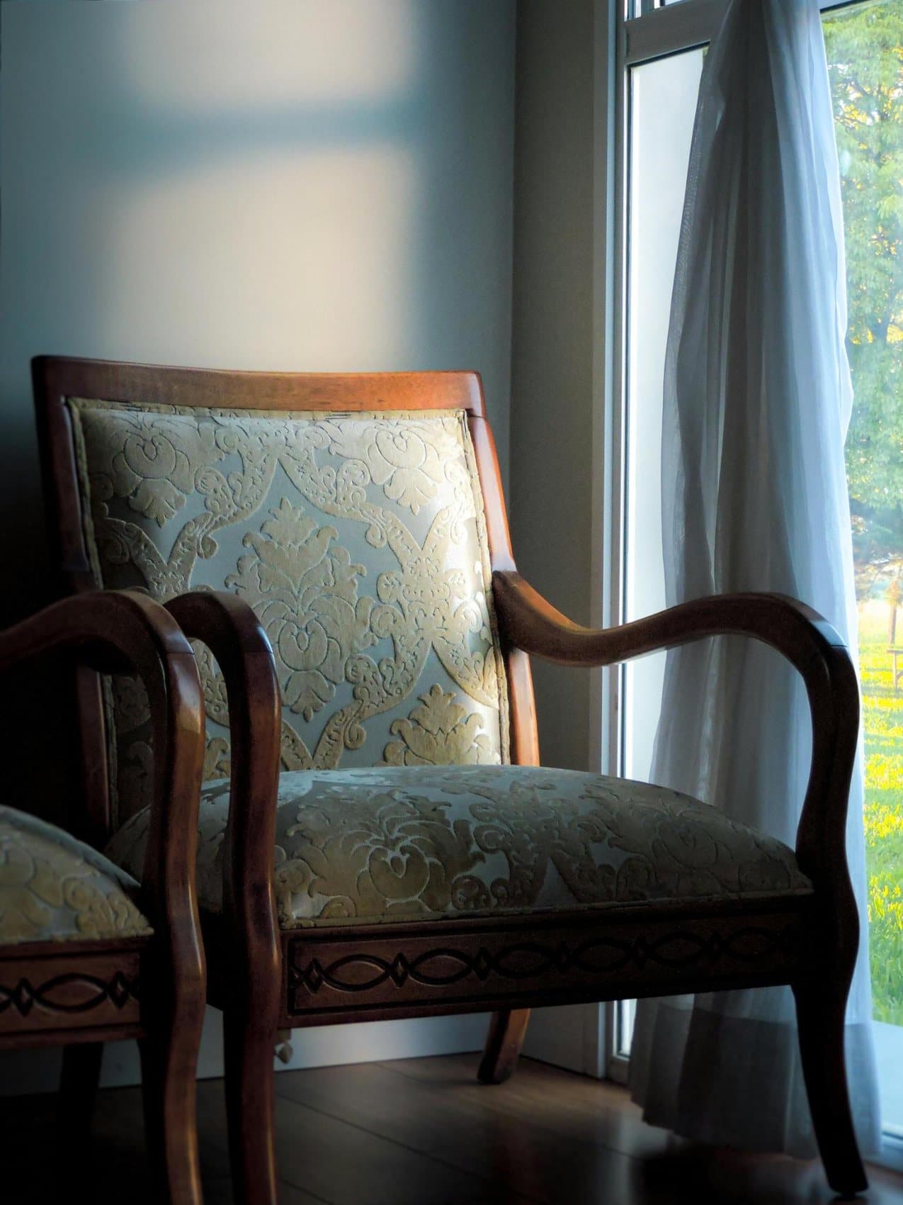 Antique brocade armchairs